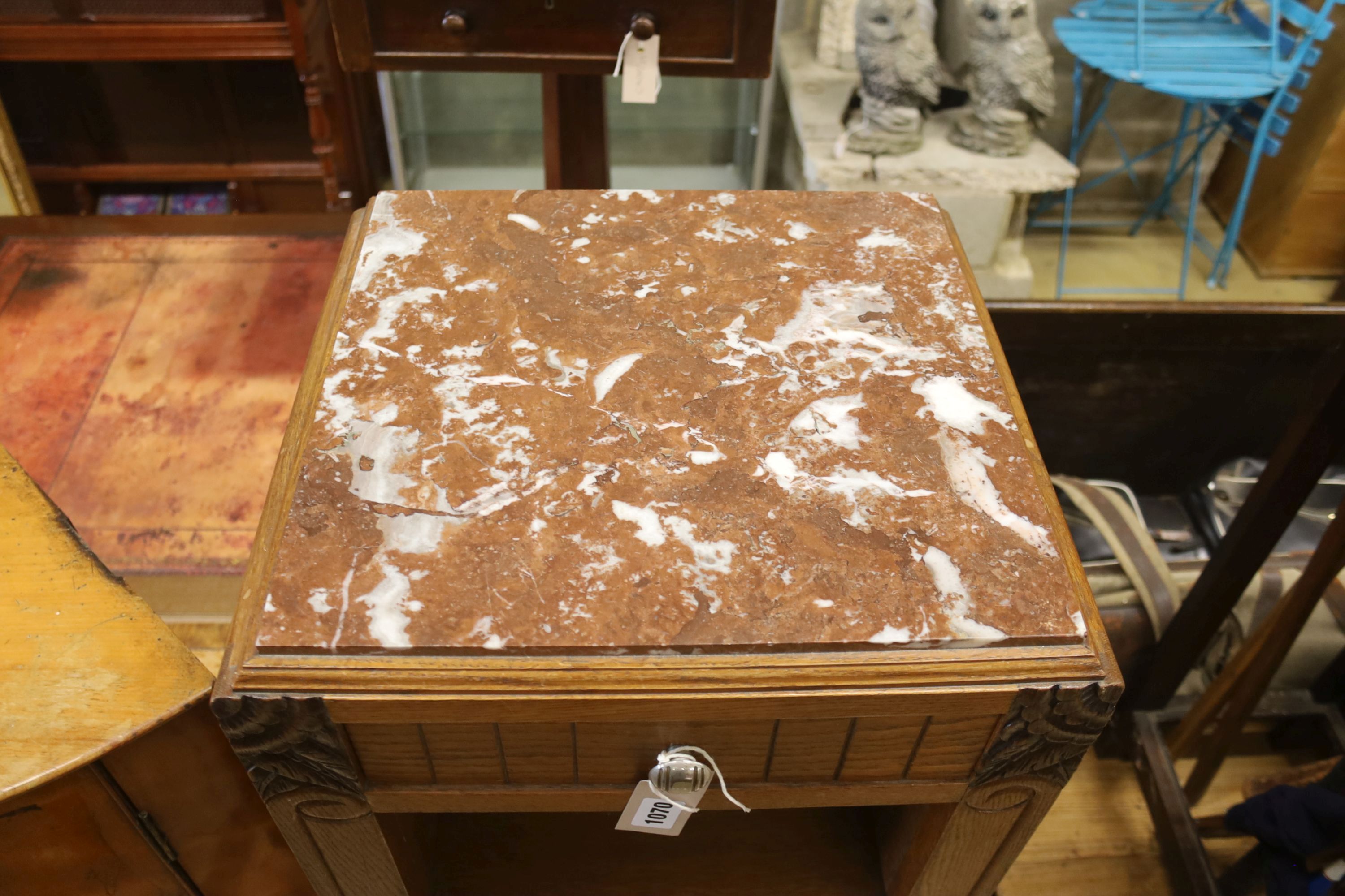 A 1930's French oak marble top bedside cabinet, width 42cm, depth 38cm, height 73cm